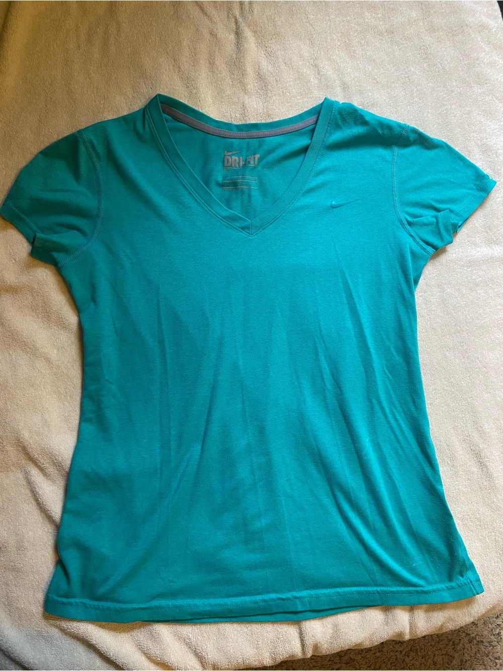 Women’s Nike Dri-fit Top
Size - Medium